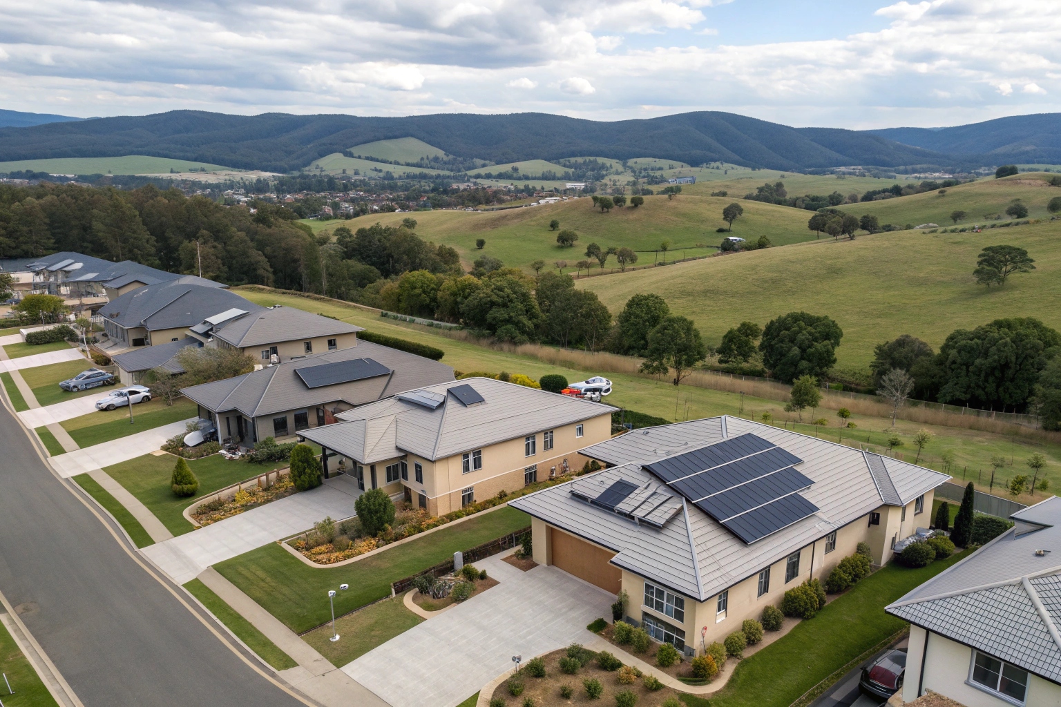Aerial view of solar panel installations across Risdon Vale residential development