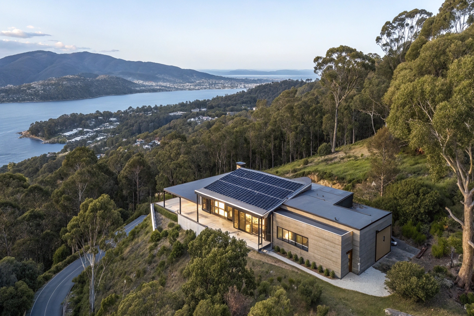 Elegant Mount Stuart home with integrated black solar panels overlooking Hobart harbour and Mount Wellington
