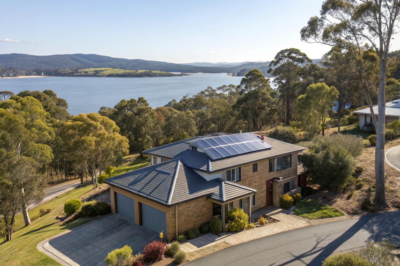 Solar panels installed on family home in Chigwell suburb with leafy trees and river views