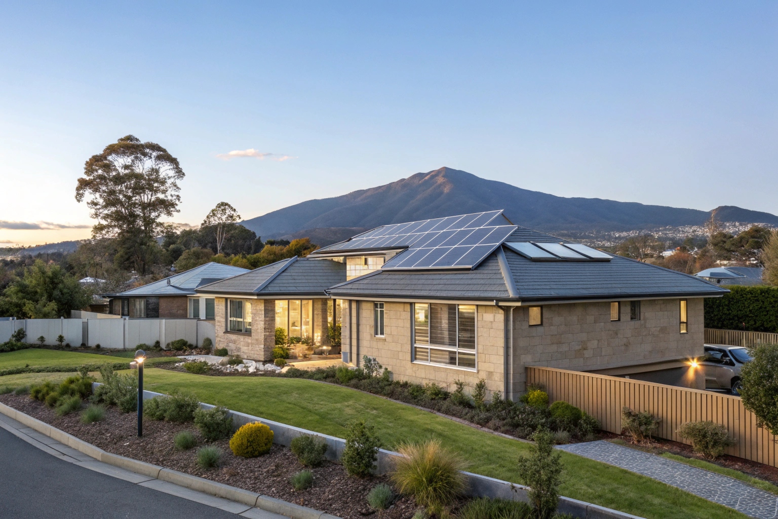 Solar panels installed on Hobart home roof with Mount Wellington in background